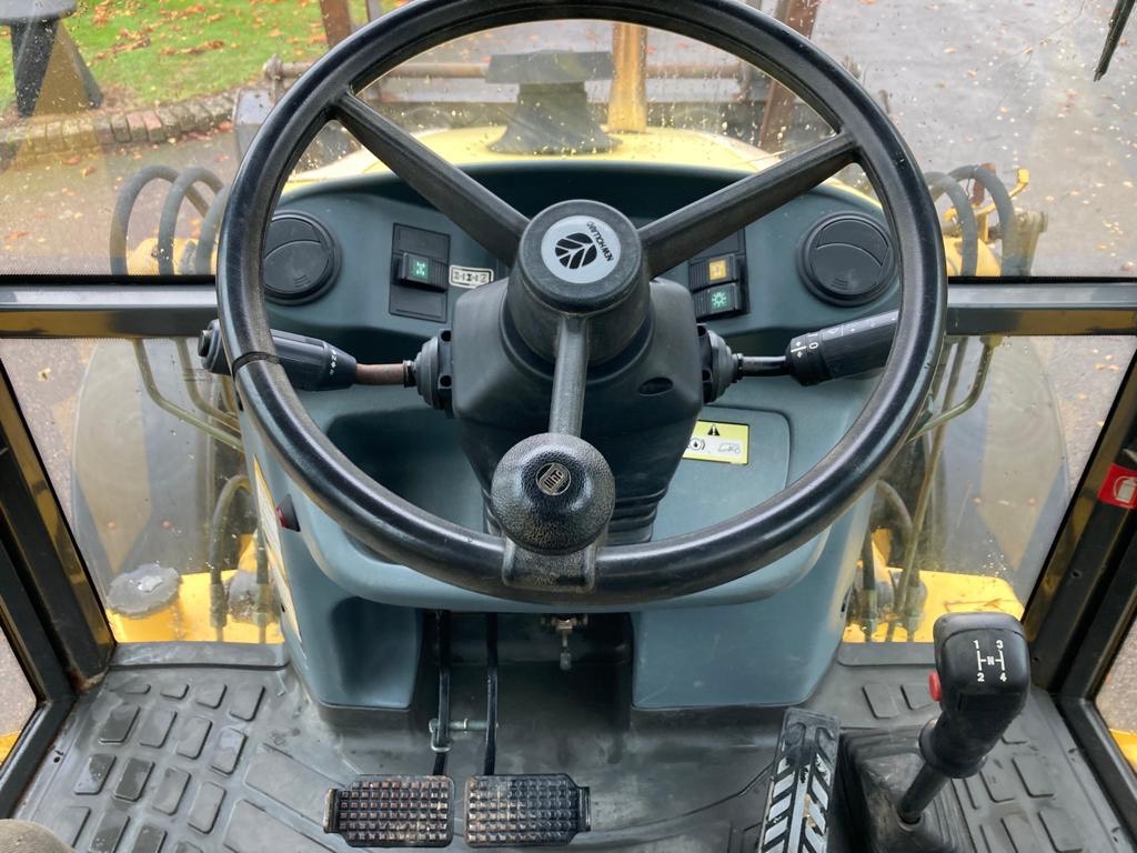 Digger Bidder - 2003 New Holland LB110-4 PT Backhoe Loader